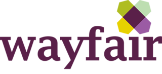 The Wayfair logo in medium purple with a symbol over the letter "i" that is composed of four icons in the shape of houses in different colors (mustard yellow, lime green, jade green and lavender purple). The house icons meet in the middle, each positioned on  side of a dark purple box, forming a crisscross shape over the letter "i".